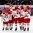 BUFFALO, NEW YORK - JANUARY 2: Denmark's Daniel Nielsen #21, Oliver Larsen #2, Malte Setkov #3 and Jonas Rondbjerg #16 celebrate a game-tying goal by Joachim Blichfeld #20 (hidden from view) against Belarus during the relegation round of the 2018 IIHF World Junior Championship. (Photo by Andrea Cardin/HHOF-IIHF Images)

